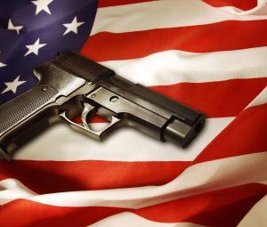 Handgun lying on American flag