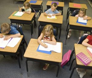 Children at desks in school