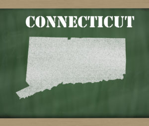 drawing of connecticut state on chalkboard, drawn by chalk